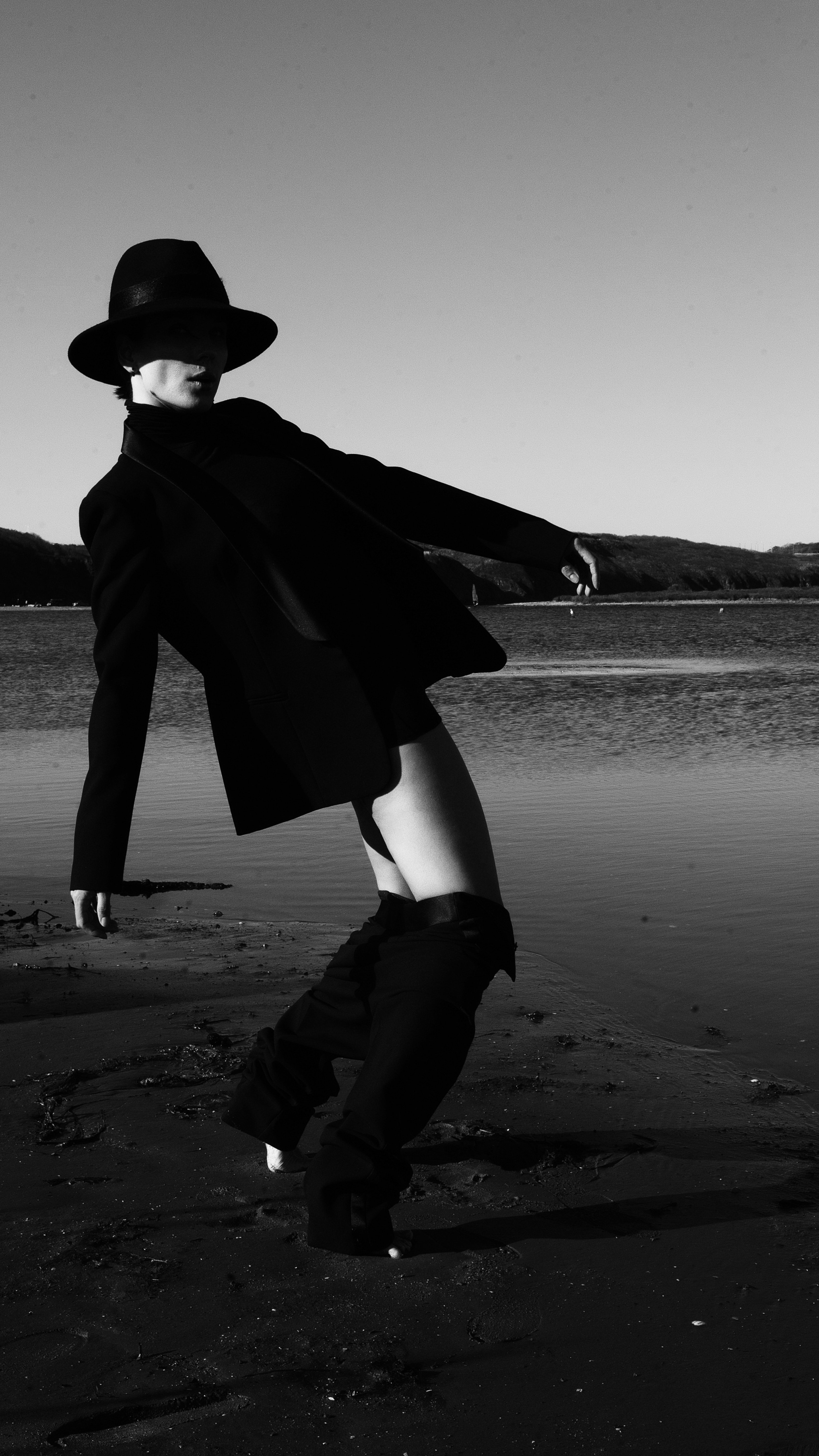 black and white image of Model Bending Her Back