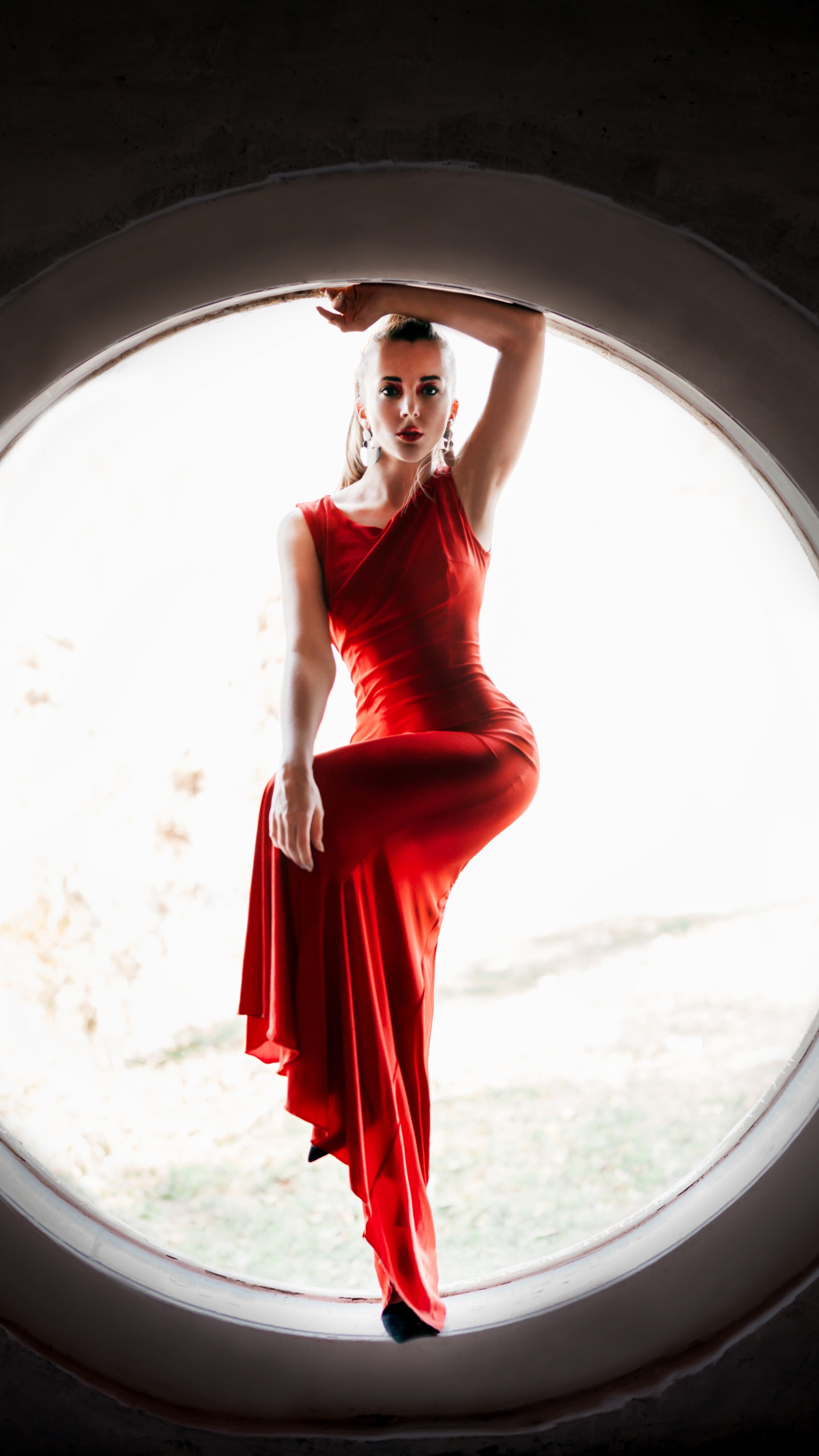 woman in a silk red dress