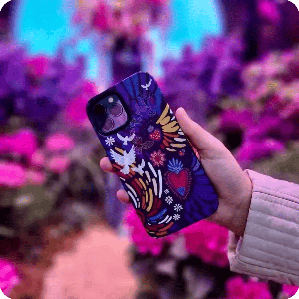 A phone cover scattered in patterns with birds, hearts and flowers in variations of lilacs, pinks and yellow